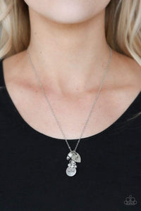 That's my mom- white necklace